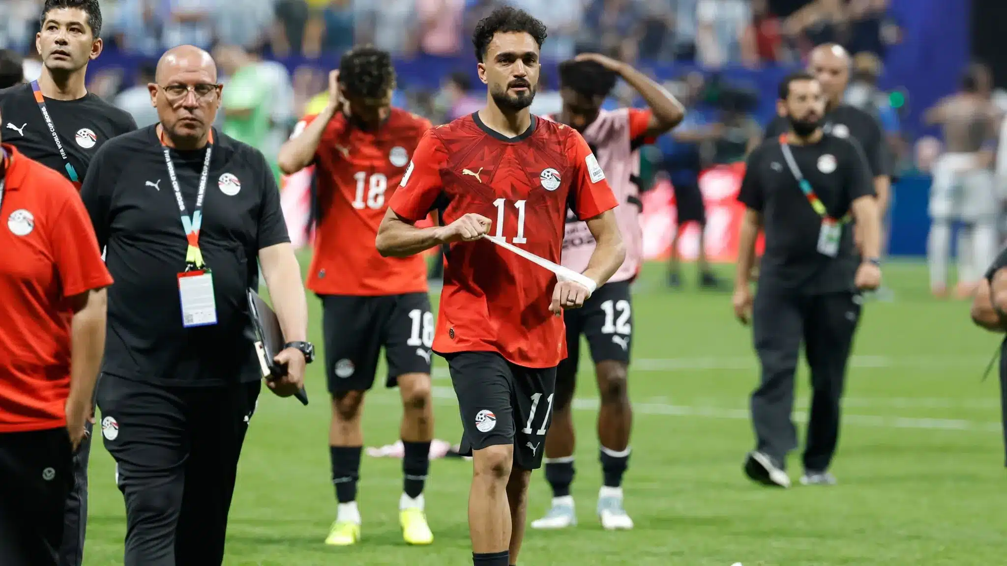 Egypt's Mostafa Zico walks off the pitch after losing to Argentina