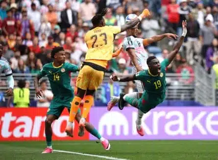 Youri Tielemans beats Mory Diaw to the ball to head in Belgium’s late leveller.