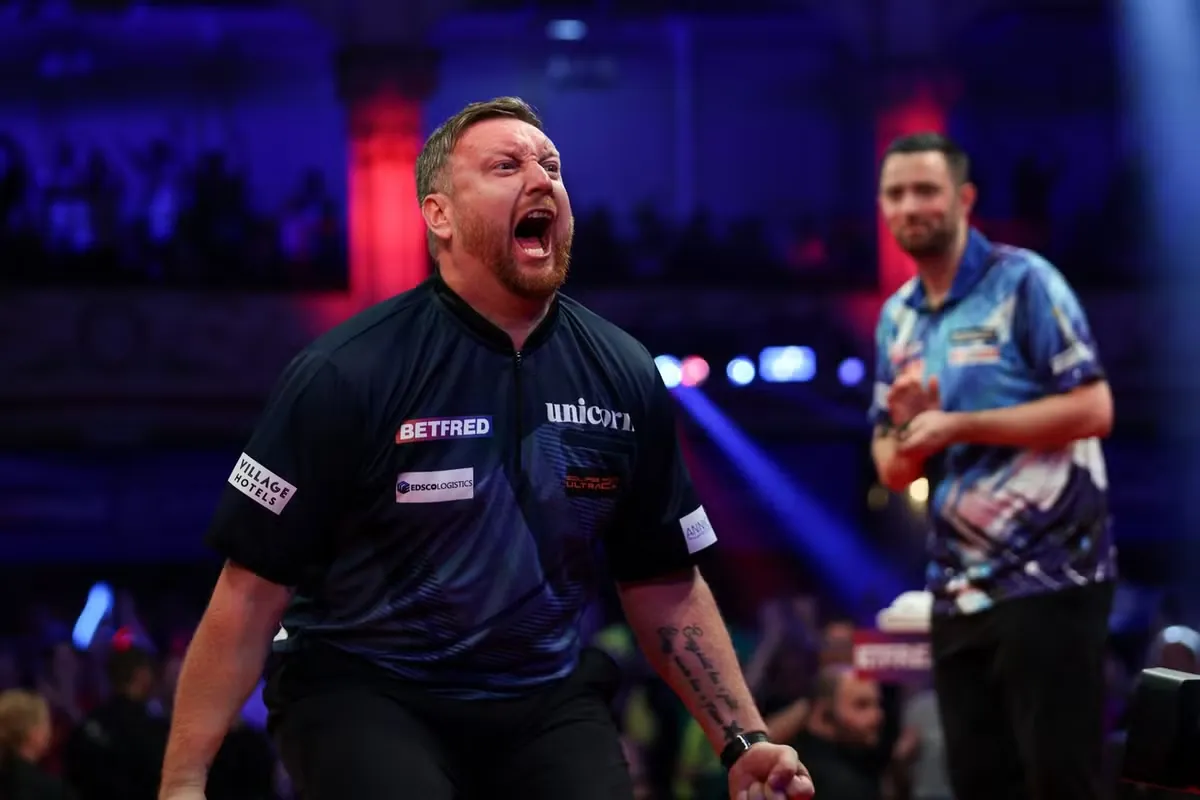 Menzies celebrates as Humphries watches on