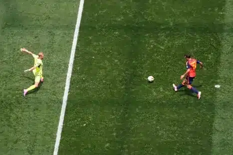 Spain's Mikel Oyarzabal scores their third goal past Alex Schlager