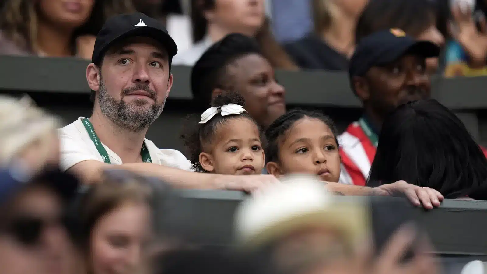 Serena Williams is cheered on by her family in her corner on Centre Court