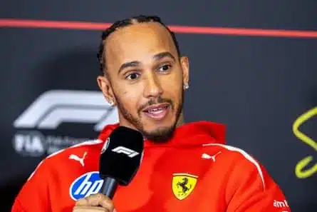 Lewis Hamilton talks to the media.