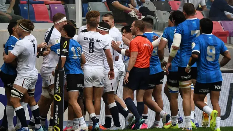 England players, wearing white shirts and socks, and Argentina players, wearing blue shirts and black shorts, come together