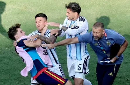 Argentina’s Nahuel Molina (centre) and Leandro Paredes clash with Gavi, leading to a red card for Paredes.