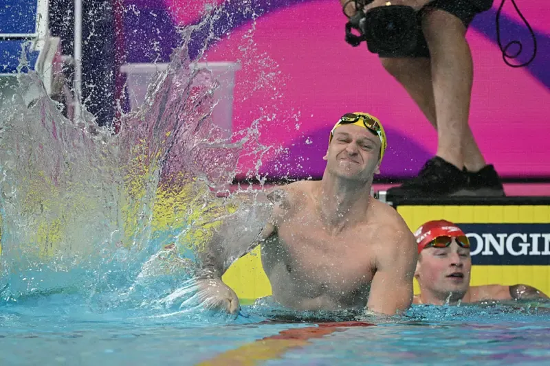 Australia Sam Williamson and England's Adam Ramsay-Peaty