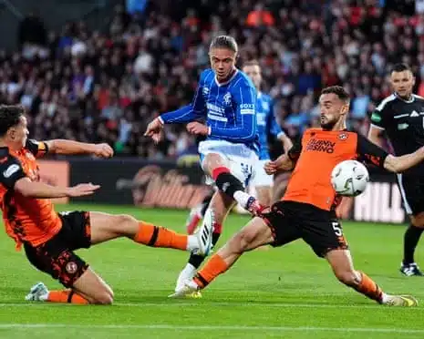 Thelo Aasgaard attempts a shot on goal during the Premiership match at Dundee United