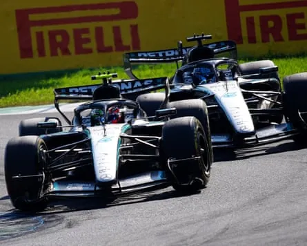 Kimi Antonelli (left) battles with teammate George Russell during the Italian Grand Prix